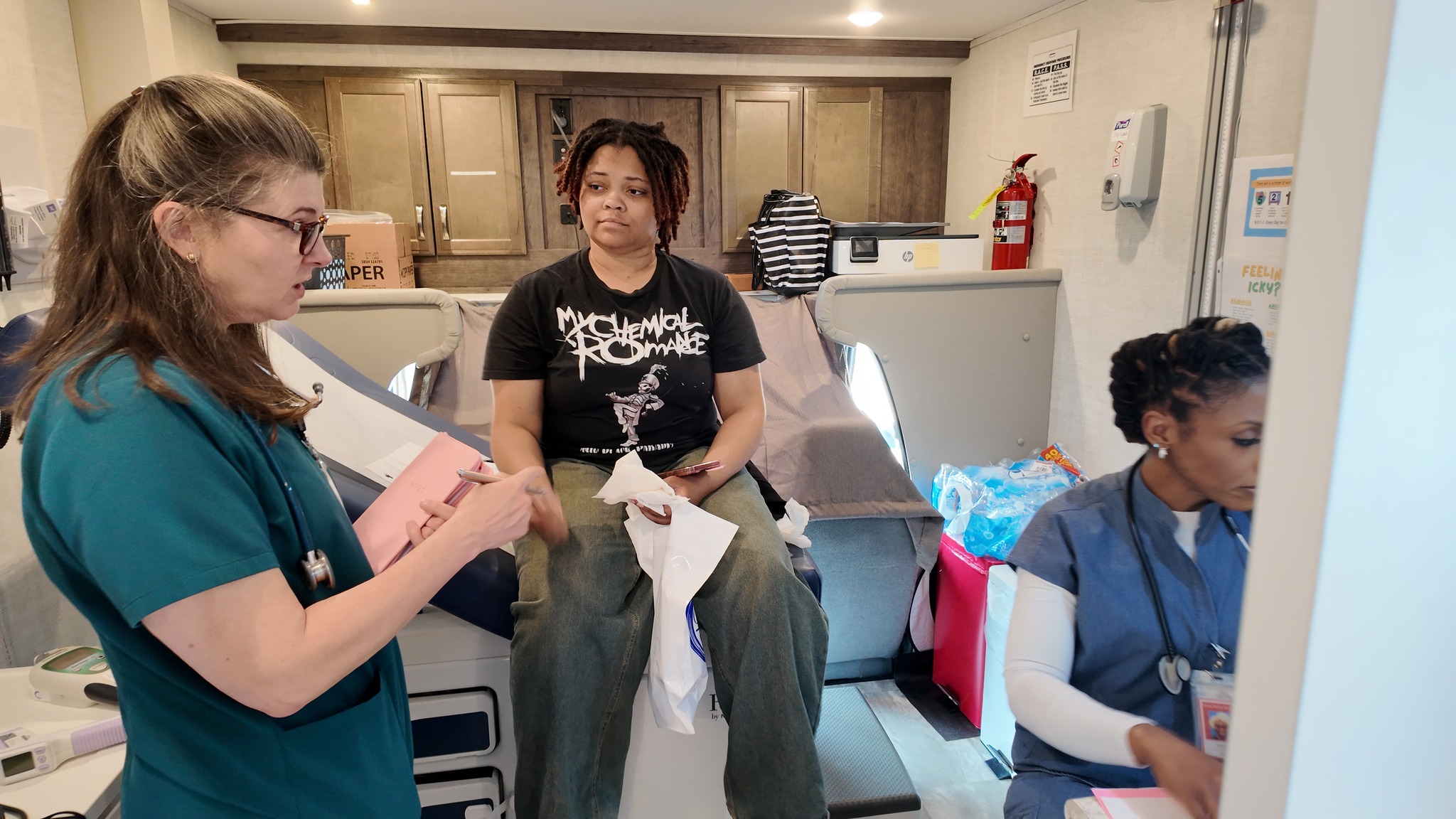 Student and staff in David Raines Mobile Health Unit